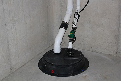 Dome lid installed in the basement for radon mitigation